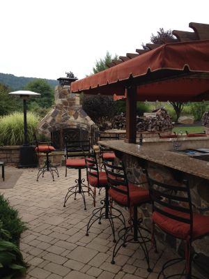 Raysco - Outside Bar and Fireplace
